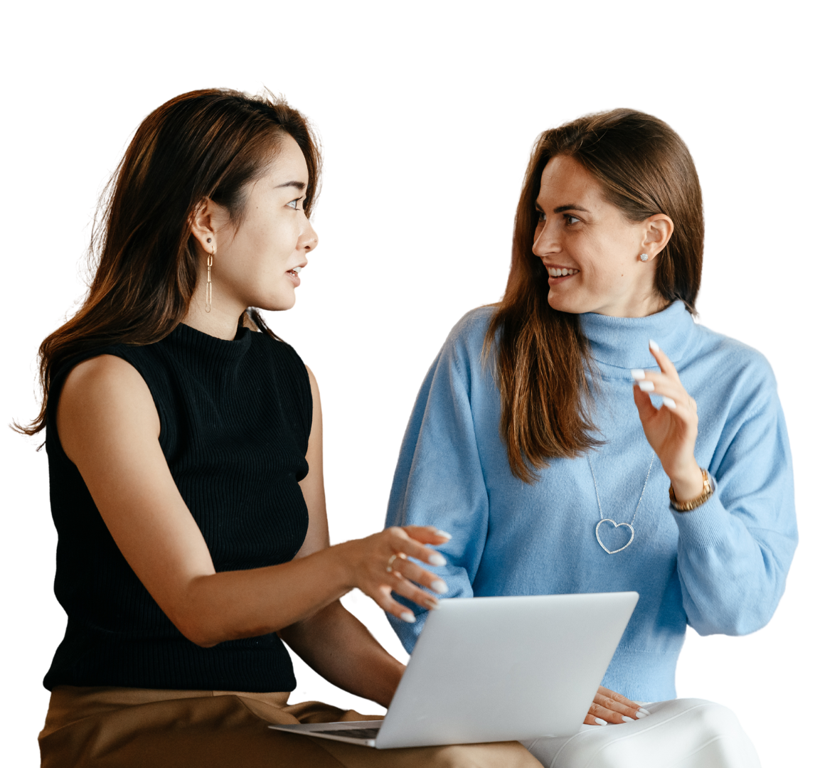 two professional individuals discussing something from a laptop